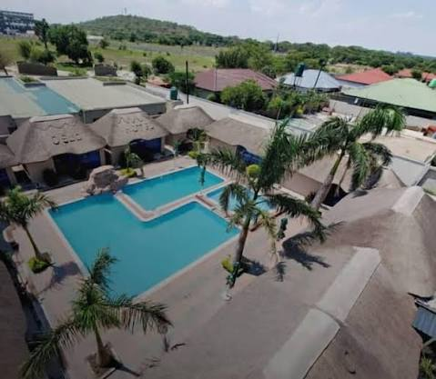 Oslo Hotel Resort Lusaka — aerial pool and grounds